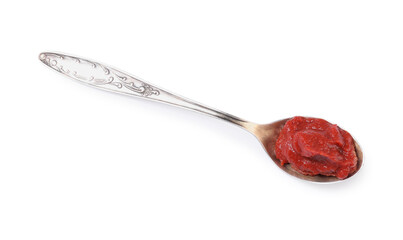 Spoon of tasty tomato paste isolated on white, top view