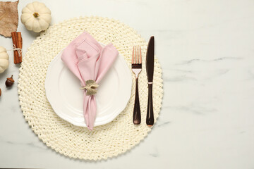 Stylish autumn table setting on white marble background, flat lay. Space for text