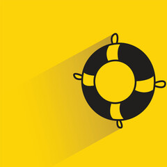 lifebuoy with shadow on yellow background