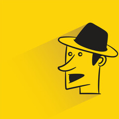 man face with shadow on yellow background