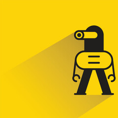 robot with shadow on yellow background