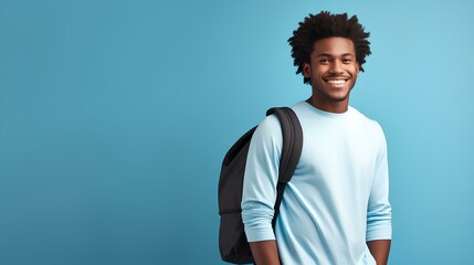 A relaxed posture of a African American male student with a backpack slung over one shoulder,...