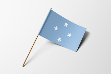 Micronesia flag of small paper, isolated on white background