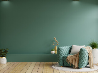 Living room with green armchair on empty dark green wall background - obrazy, fototapety, plakaty