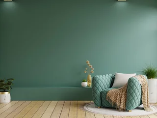 Fotobehang Per kamer Living room with green armchair on empty dark green wall background  © Vanitjan