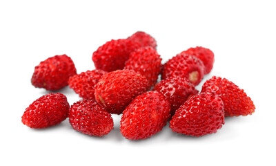 Ripe red wild strawberries isolated on white
