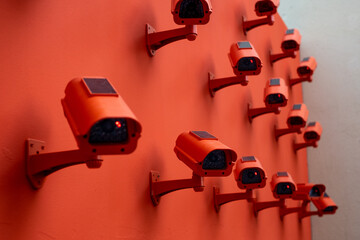 Multiple security cameras record an area