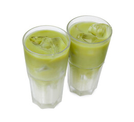Glasses of tasty iced matcha latte isolated on white