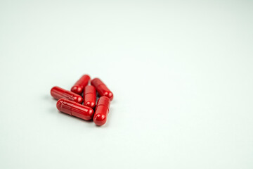 detail of several painkiller pills on white background