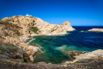 Fototapeta na wymiar The Bay of the Island Ile de de la Pietra just outside L'Ile Rousse on Corsica, France