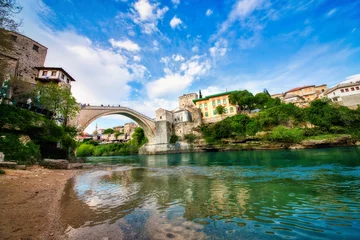 Tuinposter Stari Most The Famous Old Bridge (Stari Most) Crossing the River Neretva in Mostar, Bosnia and Herzegovina