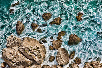 Rocks in the Water Below the Old City of Bonifacio on the Southern Tip of Corsica, France