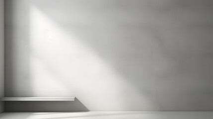 Minimal abstract light gray background for product presentation. Shadow and light from windows on plaster wall.