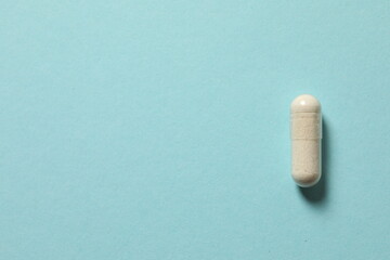pills on blue background
