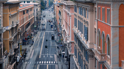 Aerial cityscape with exquisite architecture of buildings along Via XX Settembre at day, Genoa, Italy