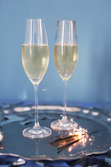 Glass of champagne on silver tray