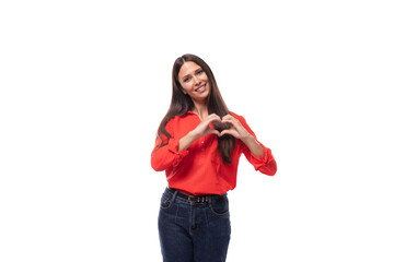 pretty confident successful young brunette business woman dressed in a red blouse on a white background with copy space