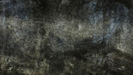 A picture of a cracked cement floor inside a building. The edge of the picture is dark.
