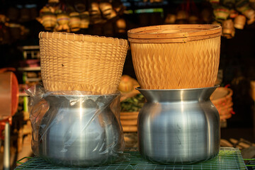 Basketry equipment made from bamboo such as sticky rice containers, food steamers, animal trapping equipment, baskets, hats.