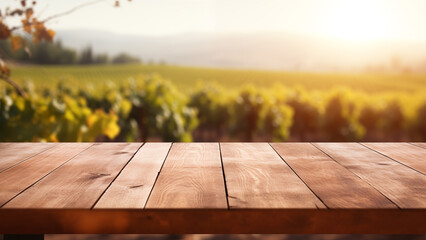 Image of an old wooden table with a vineyard background in the afternoon, for product display