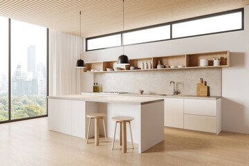 White kitchen corner with cabinets and island