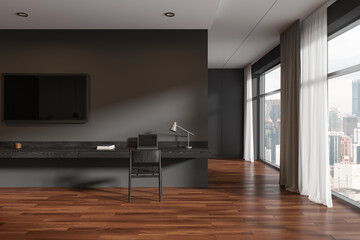 Dark hotel interior with workspace, tv display and panoramic window