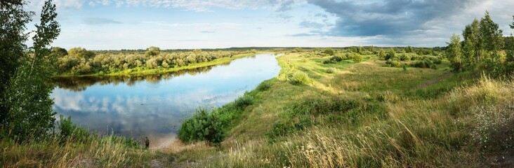 The nature of Belarus - a calm summer landscape on the banks of the Berezina River