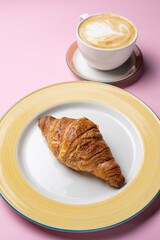 Delicious croissant on a plate