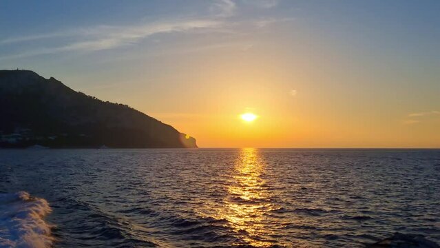 Island of Capri - Italy - Sunset when leaving the island by ship