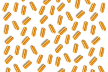 Yellow capsules. Lots of pills. on isolated transparent background