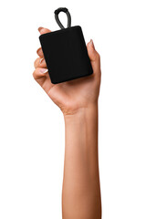A woman's hand holds a black bluetooth music speaker. on isolated transparent background
