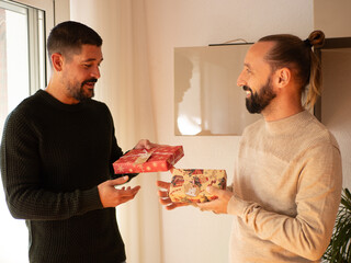 Two mens changing presents