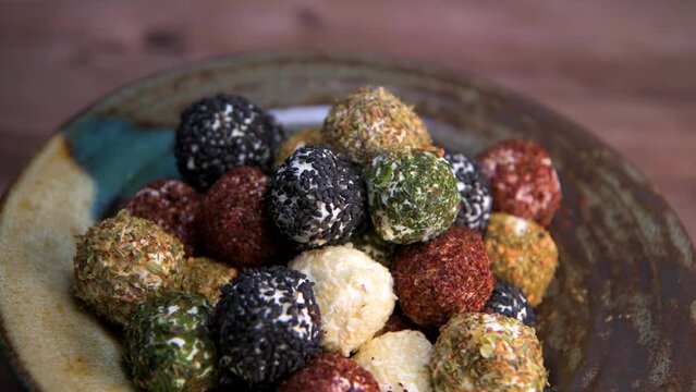 RECIPE FOR LABNEH CHEESE BOLLS WITH DRIED MINT, WHITE AND BLACK SESAME, SUMAC AND ZAATAR. High quality video