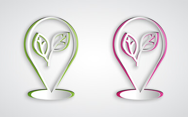 Paper cut Location pin with leaf inside icon isolated on grey background. Leaves sign. Fresh natural product symbol. Paper art style. Vector