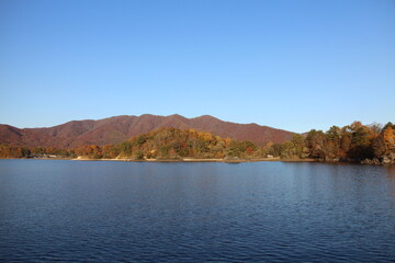 Autumn scenery of Lake Hibara and mountains with autumn leaves in Urabandai, Fukushima, Japan