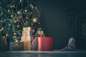 Gift Box in Dark Home Room.