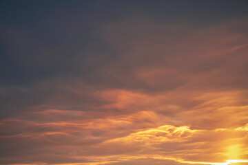 beautiful orange dramatic clouds at sunset