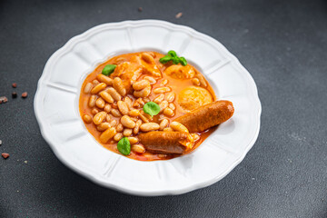 cassoulet thick bean soup meat, beans, sausages eating cooking appetizer meal food snack on the table copy space