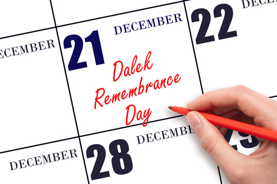 December 21. Hand writing text Dalek Remembrance Day on calendar date. Save the date.