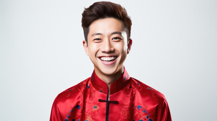 Obraz premium Portrait of smiling vogue Asian man with Chinese traditional clothing