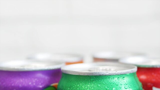 Various Cold, Sweet, and Carbonated Refreshing Drinks. Shooting with Refreshing Pop Can Drinks.