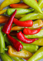 Red, yellow and green Bell Peppers. Vertical photo
