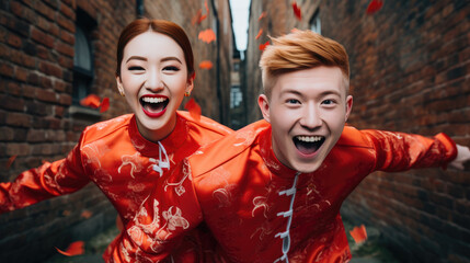 Obraz premium Happy young Asian couple with Chinese traditional clothing