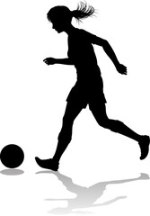 A female soccer football player woman in silhouettes