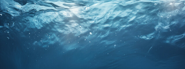 Fototapeta na wymiar Serene water surface with gentle ripples.