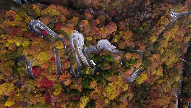 Aerial footage of Irohazaka winding roads connects the lower elevations near central Nikko to the higher elevations of Okunikko region in Tochigi prefecture, Japan
