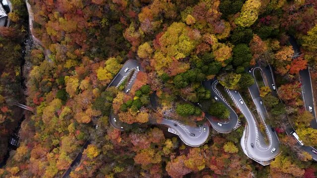 Aerial footage of Irohazaka winding roads connects the lower elevations near central Nikko to the higher elevations of Okunikko region in Tochigi prefecture, Japan