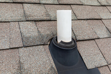 Old vent pipe flashing boot on roof of house. Roofing repair, home maintenance, and home inspection concept - obrazy, fototapety, plakaty