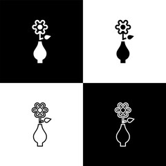 Set Flower in vase icon isolated on black and white background. Vector