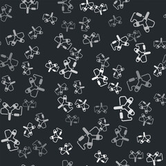 Grey Slingshot icon isolated seamless pattern on black background. Vector